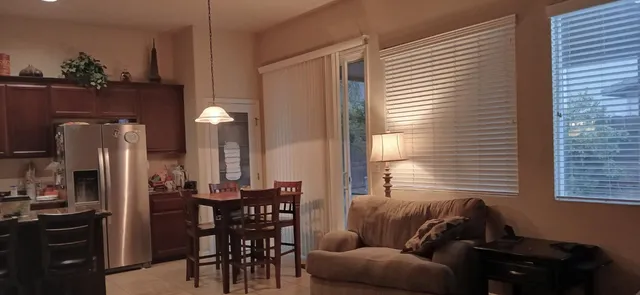 a view of a livingroom with furniture and window