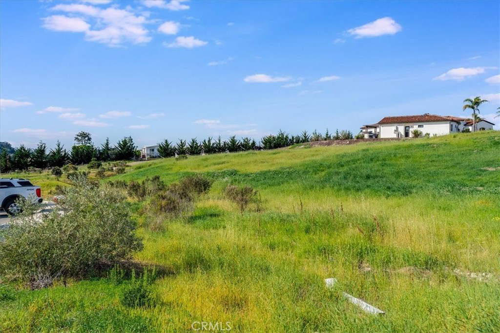 488 Del Sur Arroyo Grande, CA 93420 - Photo 35 of 35 a view of a lake with a house in the background