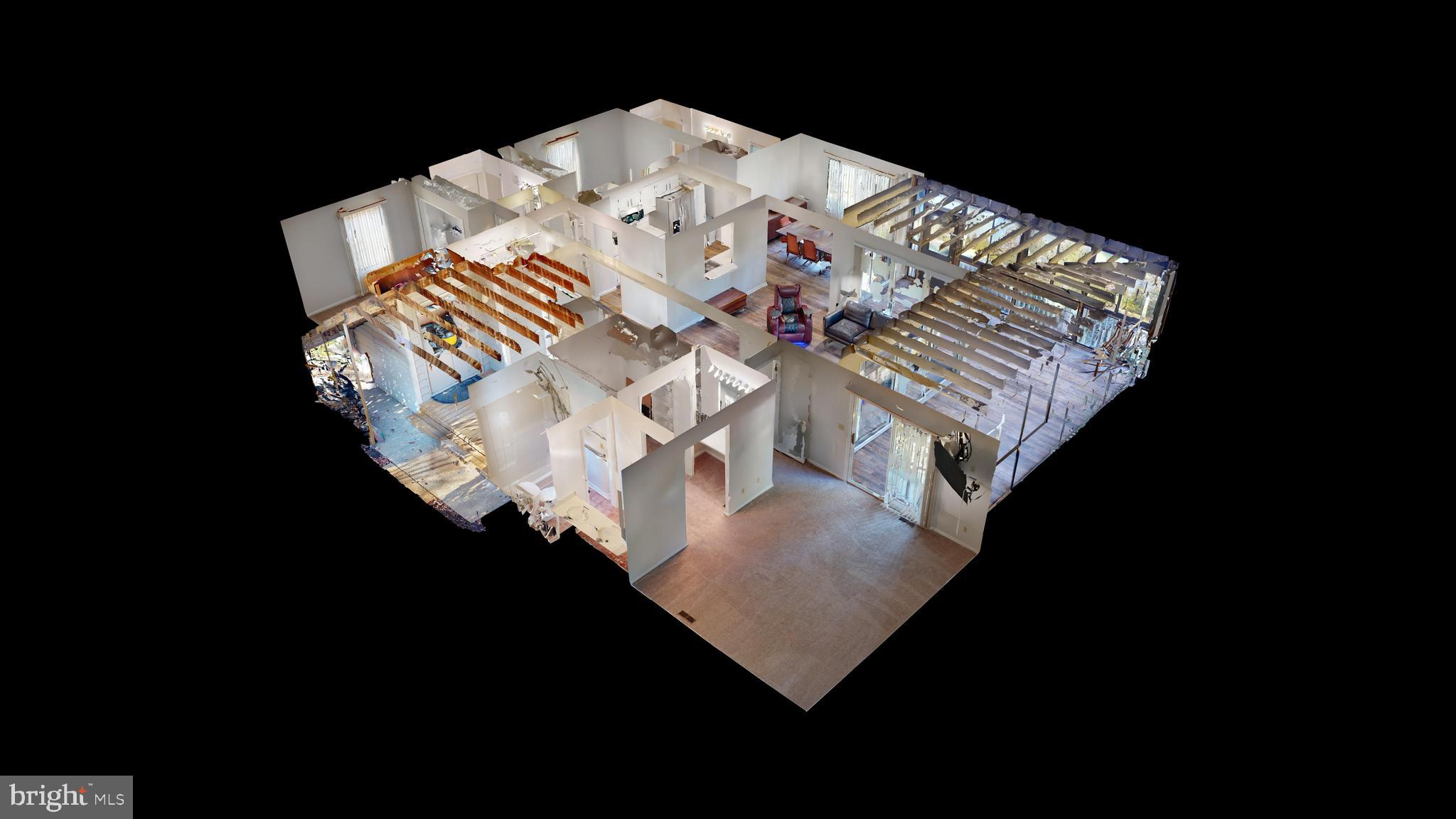 33945 Middleton Circle, Unit 1 Lewes, DE 19958 - Photo 29 of 45 a view of table and chair in the room
