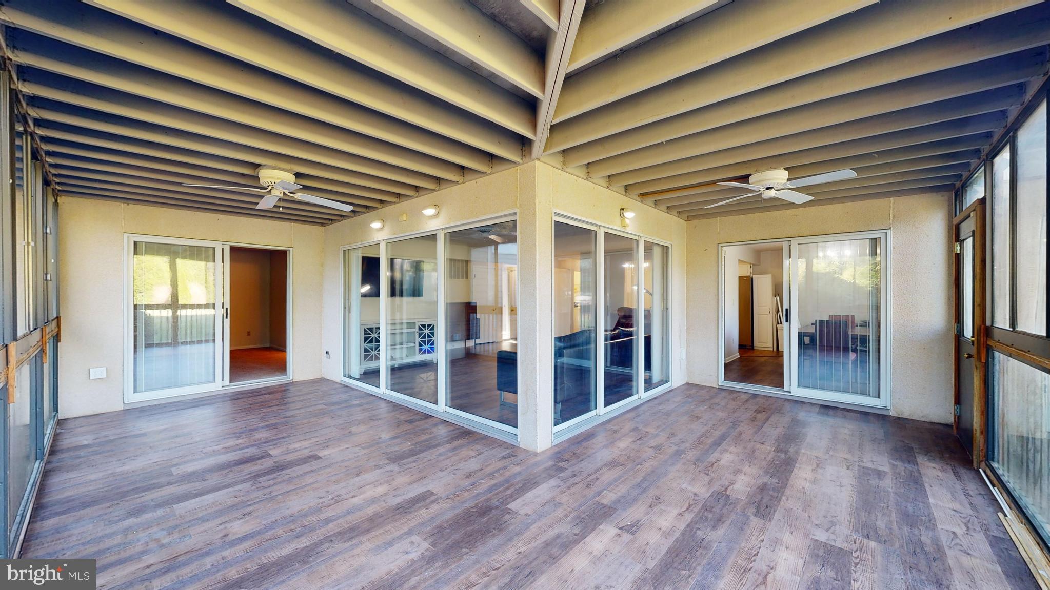 33945 Middleton Circle, Unit 1 Lewes, DE 19958 - Photo 10 of 45 a view of gallery with wooden floor