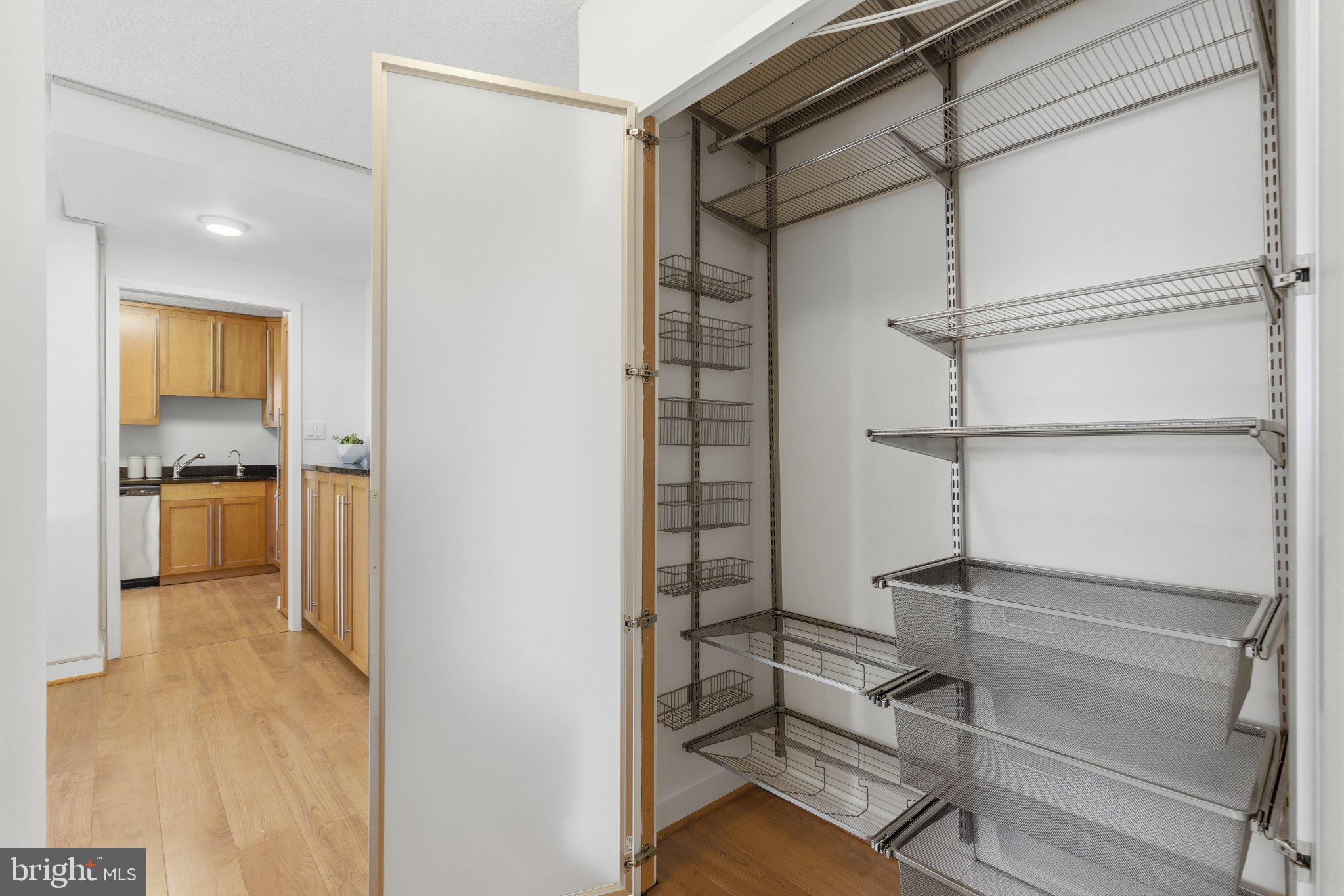 5225 Pooks Hill Road, Unit 1323S Bethesda, MD 20814 - Photo 26 of 39 a view of walk in closet with empty racks