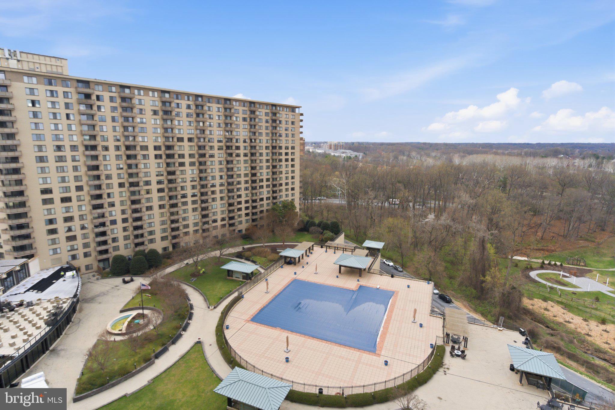 5225 Pooks Hill Road, Unit 1323S Bethesda, MD 20814 - Photo 29 of 39 swimming pool view with a seating space