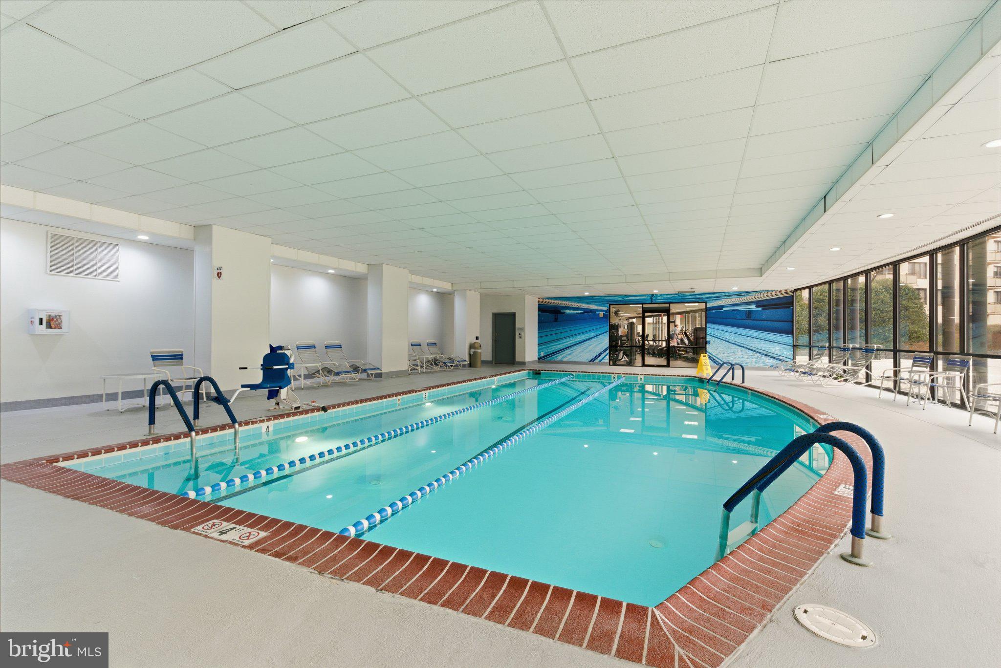 5225 Pooks Hill Road, Unit 1323S Bethesda, MD 20814 - Photo 33 of 39 a room with pool table and windows
