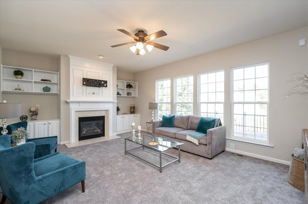 7810 San Gabriel Street Raleigh, NC 27613 - Photo 7 of 29 Spacious family room with gas fireplace and built-ins! Family Room