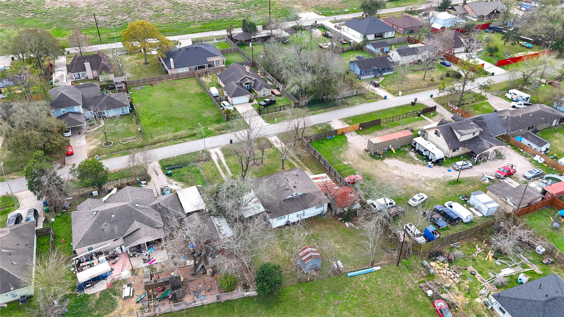 6109 Hertford Street Houston, TX 77048 - Photo 11 of 34 an aerial view of residential houses with outdoor space