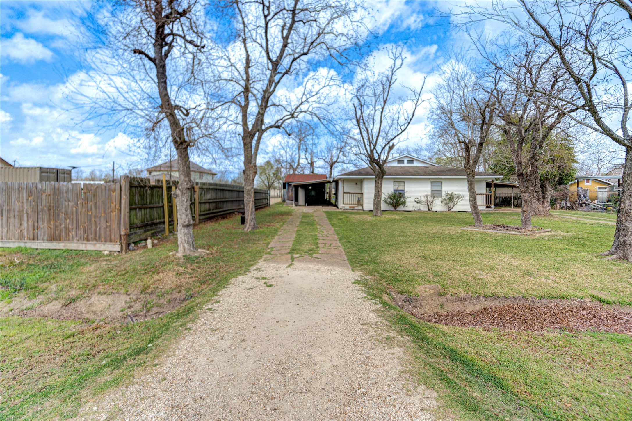 6109 Hertford Street Houston, TX 77048 - Photo 23 of 34 a view of a yard with plants and trees
