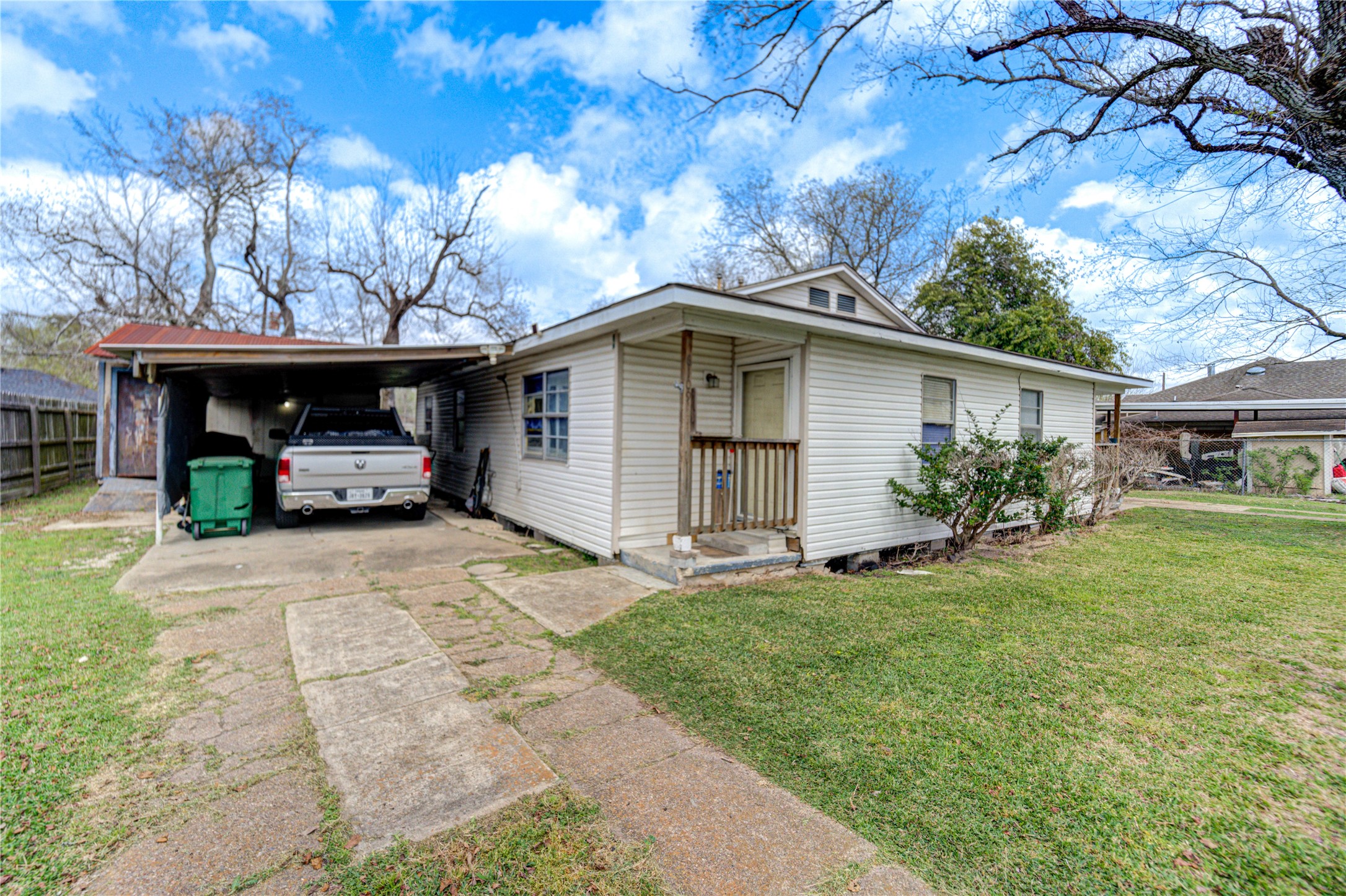 6109 Hertford Street Houston, TX 77048 - Photo 28 of 34 a front view of house with yard and trees
