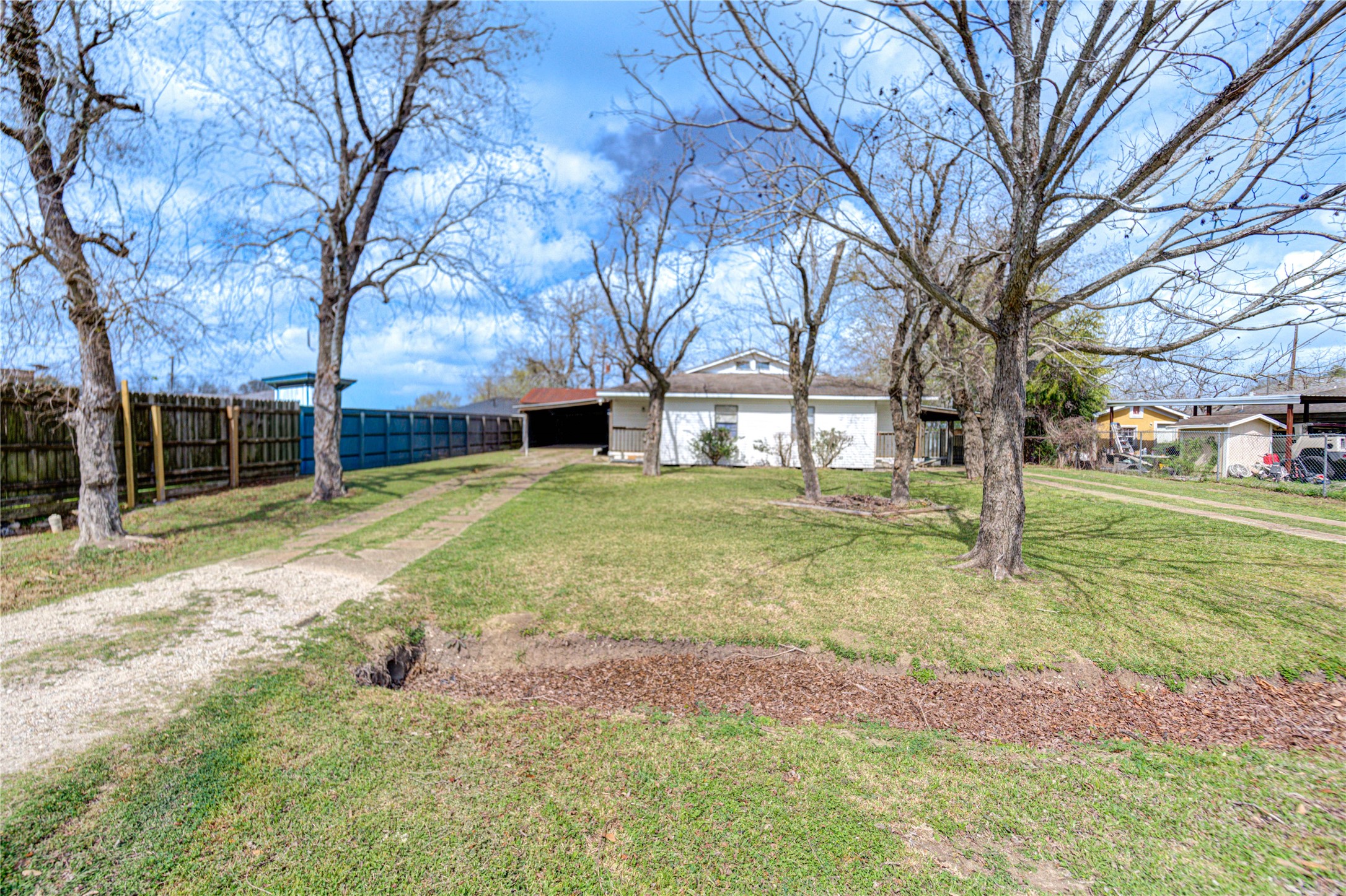 6109 Hertford Street Houston, TX 77048 - Photo 31 of 34 a view of a yard with large tree