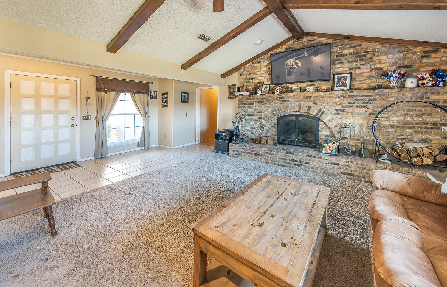 6 Ridge Road Ransom Canyon, TX 79366 - Photo 2 of 31 a view of a livingroom with furniture and a fireplace