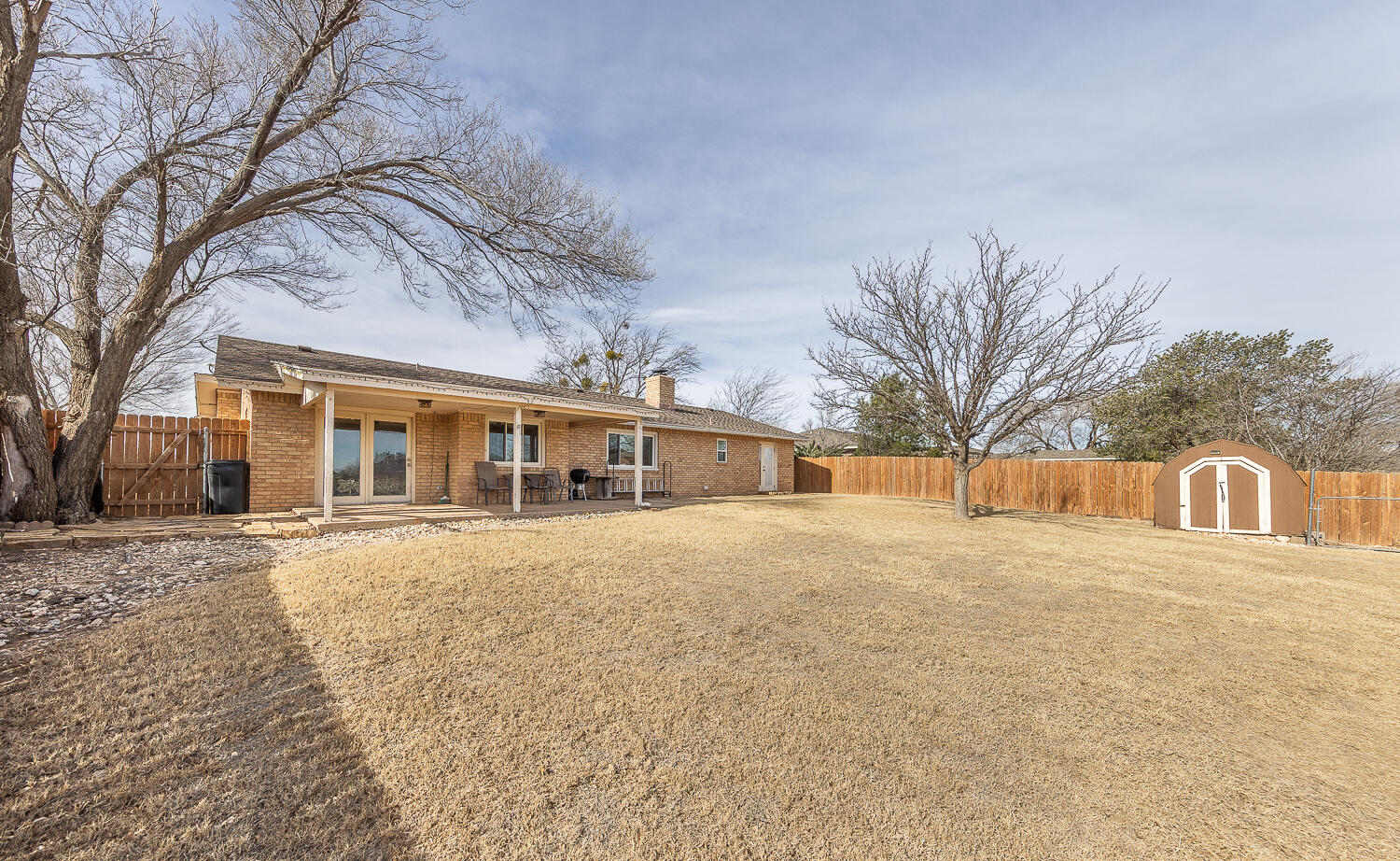 6 Ridge Road Ransom Canyon, TX 79366 - Photo 24 of 31 a front view of house with yard and trees around