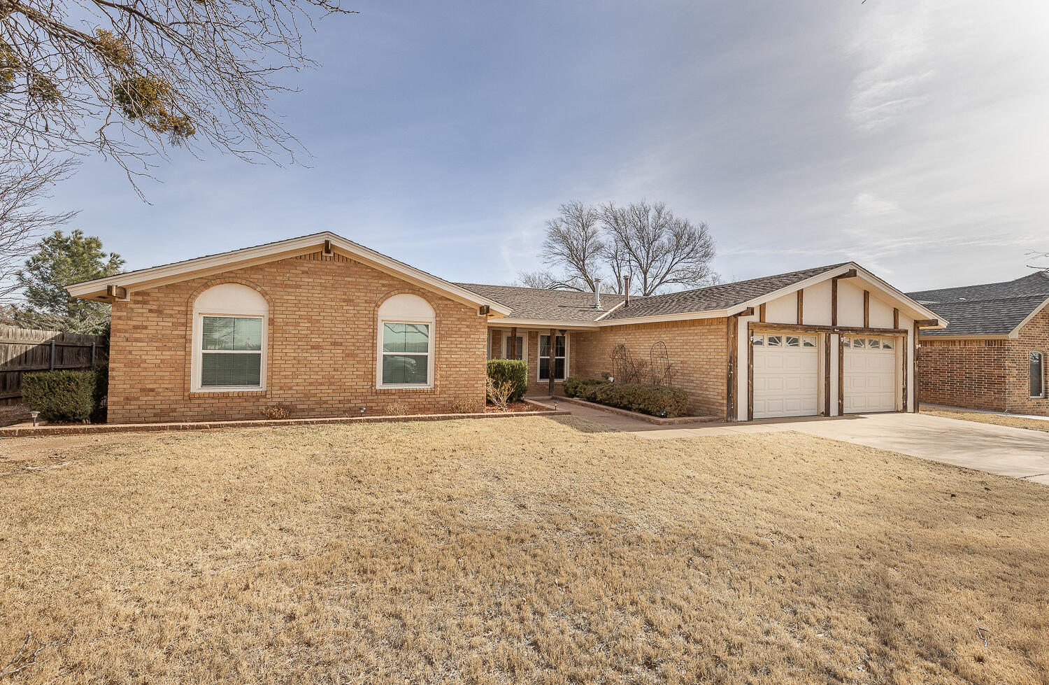6 Ridge Road Ransom Canyon, TX 79366 - Photo 30 of 31 a front view of a house with a yard and garage