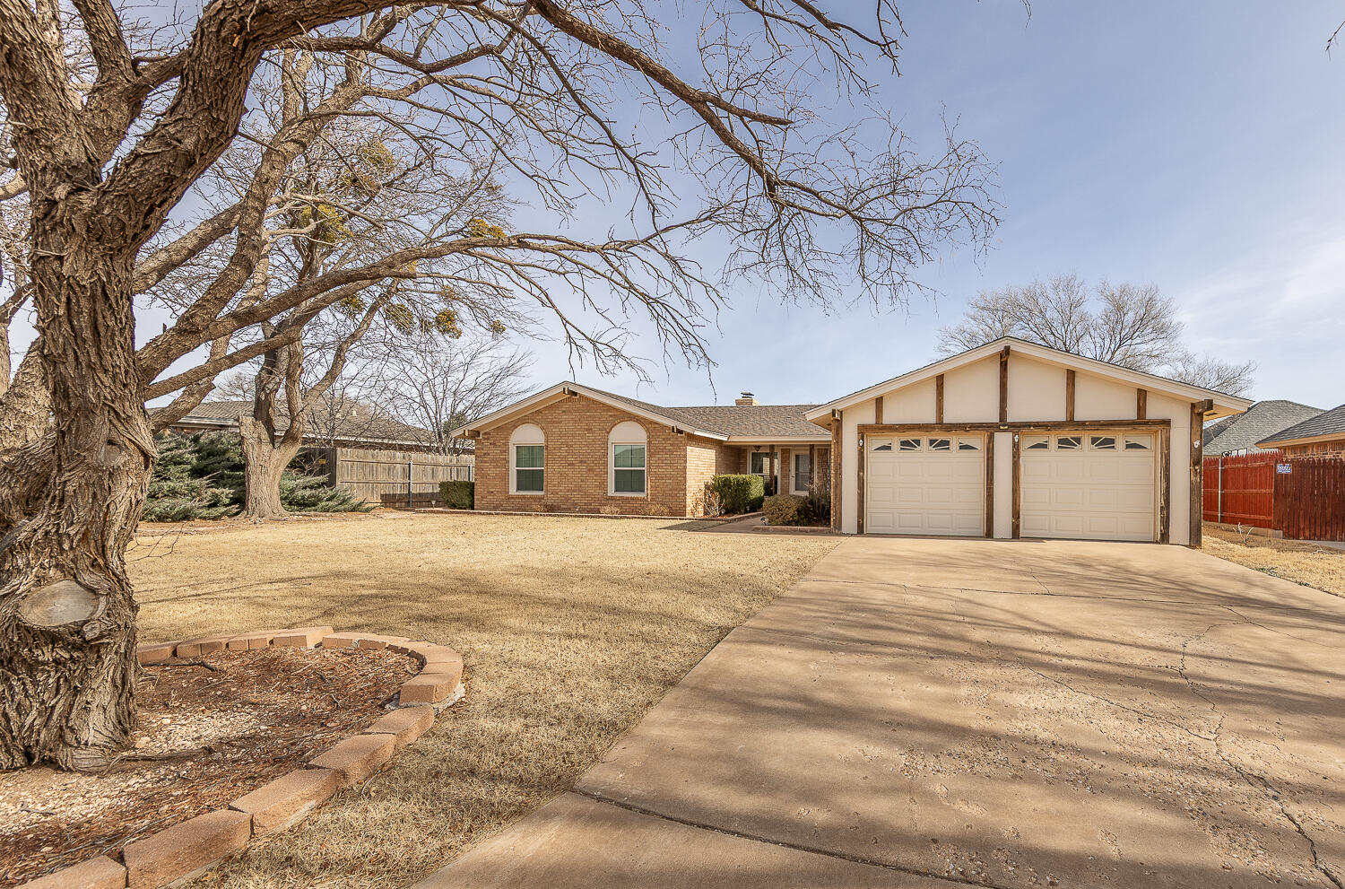 6 Ridge Road Ransom Canyon, TX 79366 - Photo 31 of 31 a front view of a house with a yard and garage