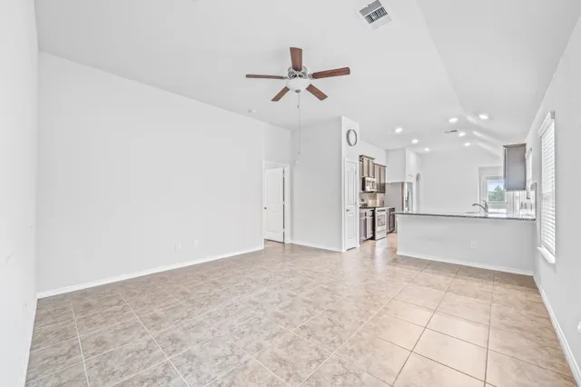 a view of a kitchen with a sink