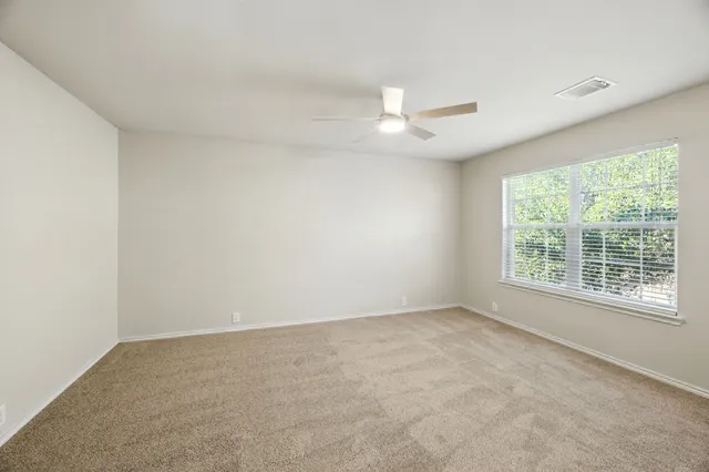 a bathroom with a double vanity sink a mirror and a bathtub