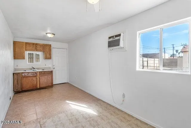 a view of a room with an empty space