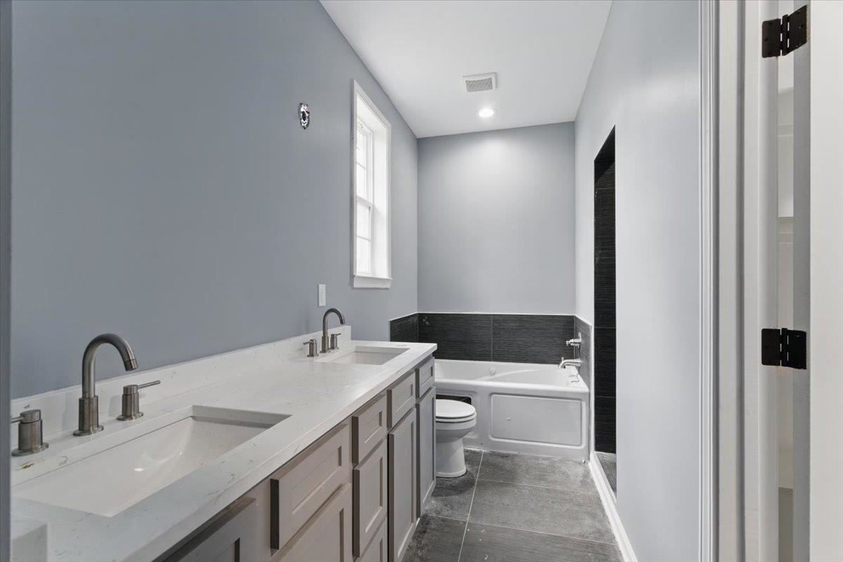 3113 Allison Avenue Memphis, TN 38112 - Photo 15 of 24 a bathroom with a sink toilet and shower