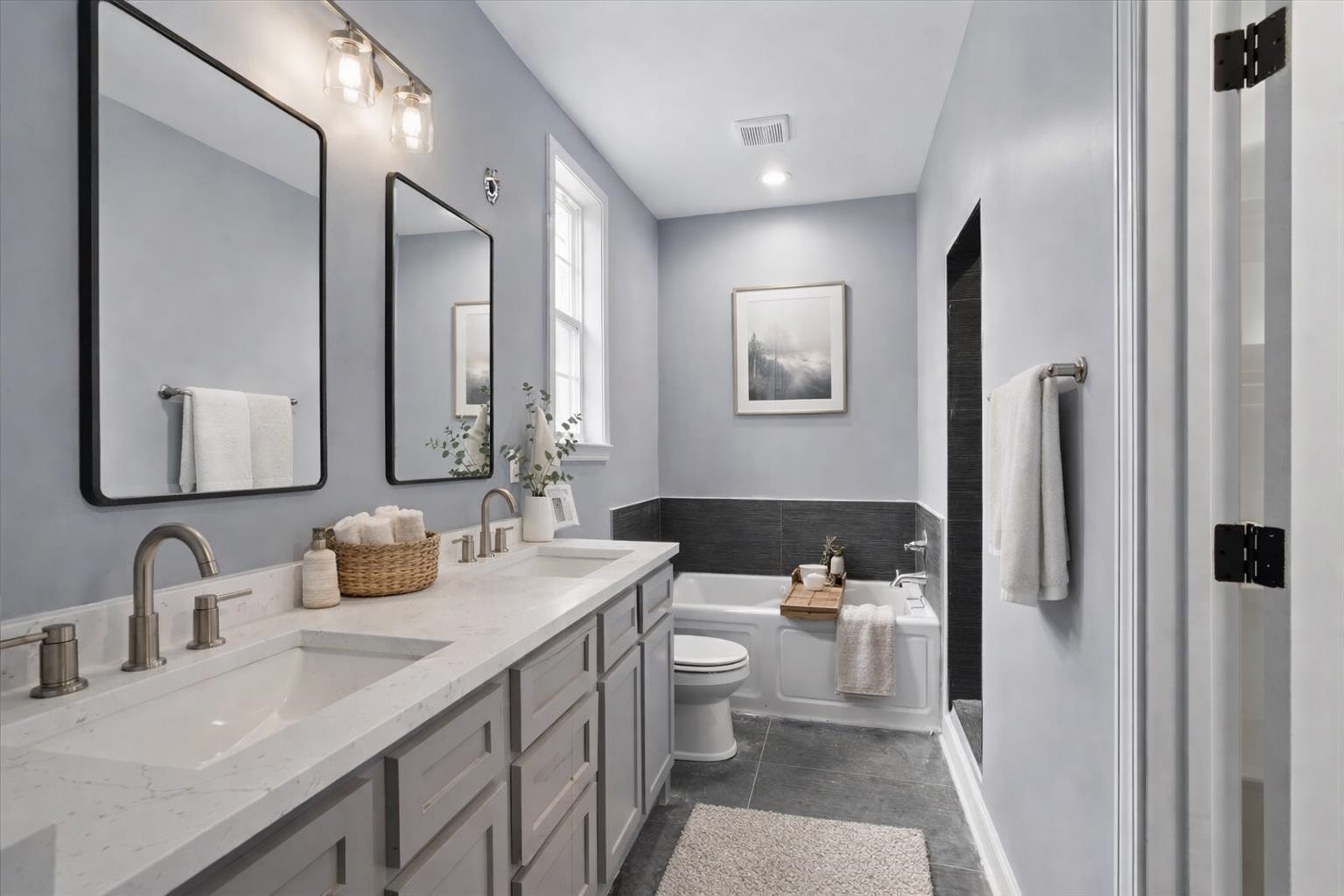 3113 Allison Avenue Memphis, TN 38112 - Photo 16 of 24 a bathroom with a sink and a mirror