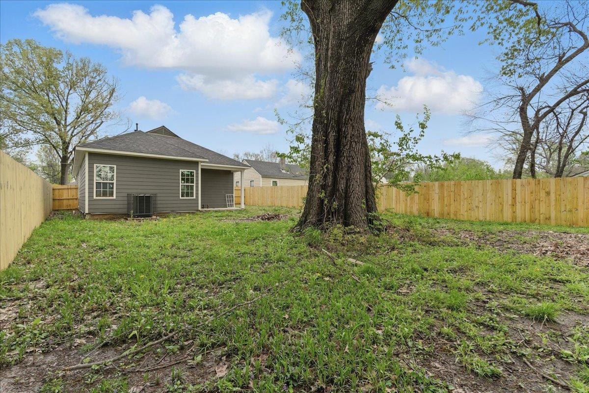 3113 Allison Avenue Memphis, TN 38112 - Photo 24 of 24 a view of a house with a yard and a large tree