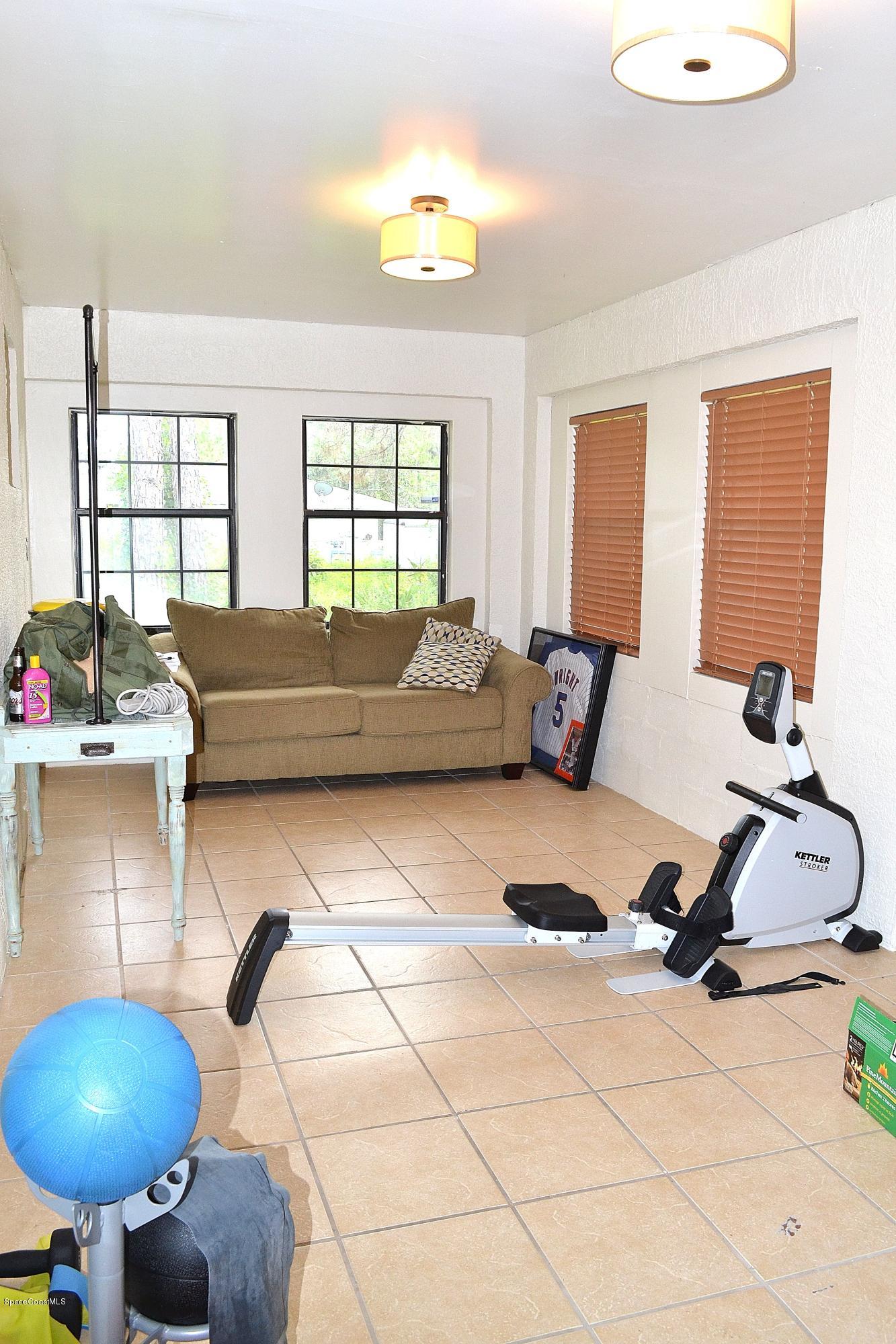 1237 Rayfield Street Southeast Palm Bay, FL 32909 - Photo 20 of 22 florida room
