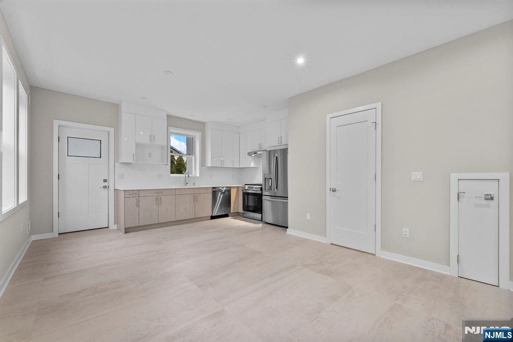 743 Kingsland Avenue, Unit 1 Ridgefield, NJ 07657 - Photo 12 of 27 a view of a kitchen with a sink