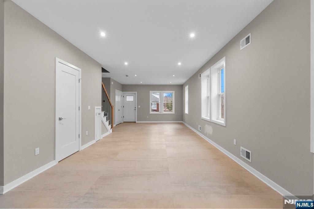 743 Kingsland Avenue, Unit 1 Ridgefield, NJ 07657 - Photo 6 of 27 a view of an empty room with a window