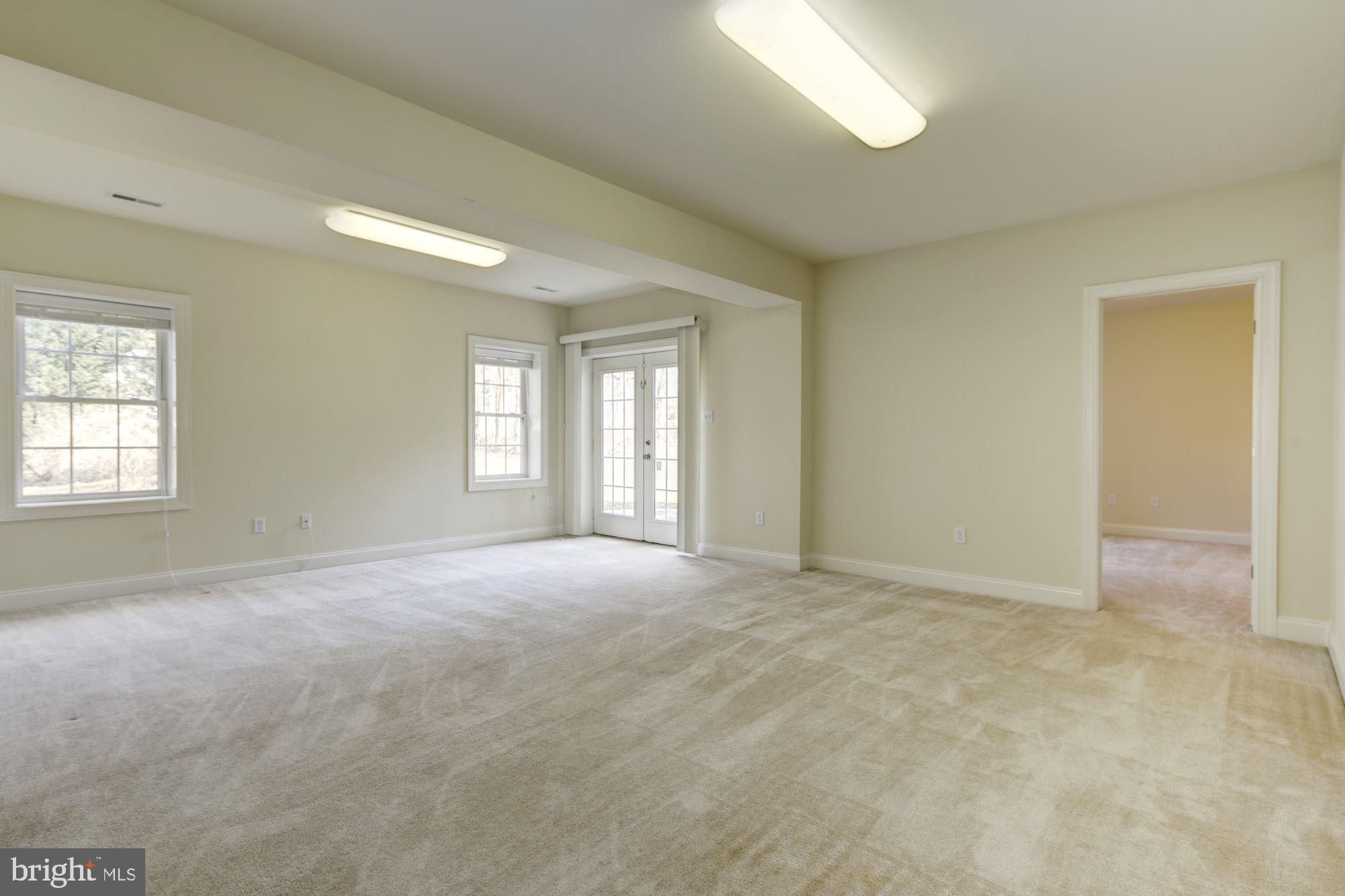 9604 Owen Brown Road Columbia, MD 21045 - Photo 54 of 73 Lower Level Fully Finished Walk Out Basement