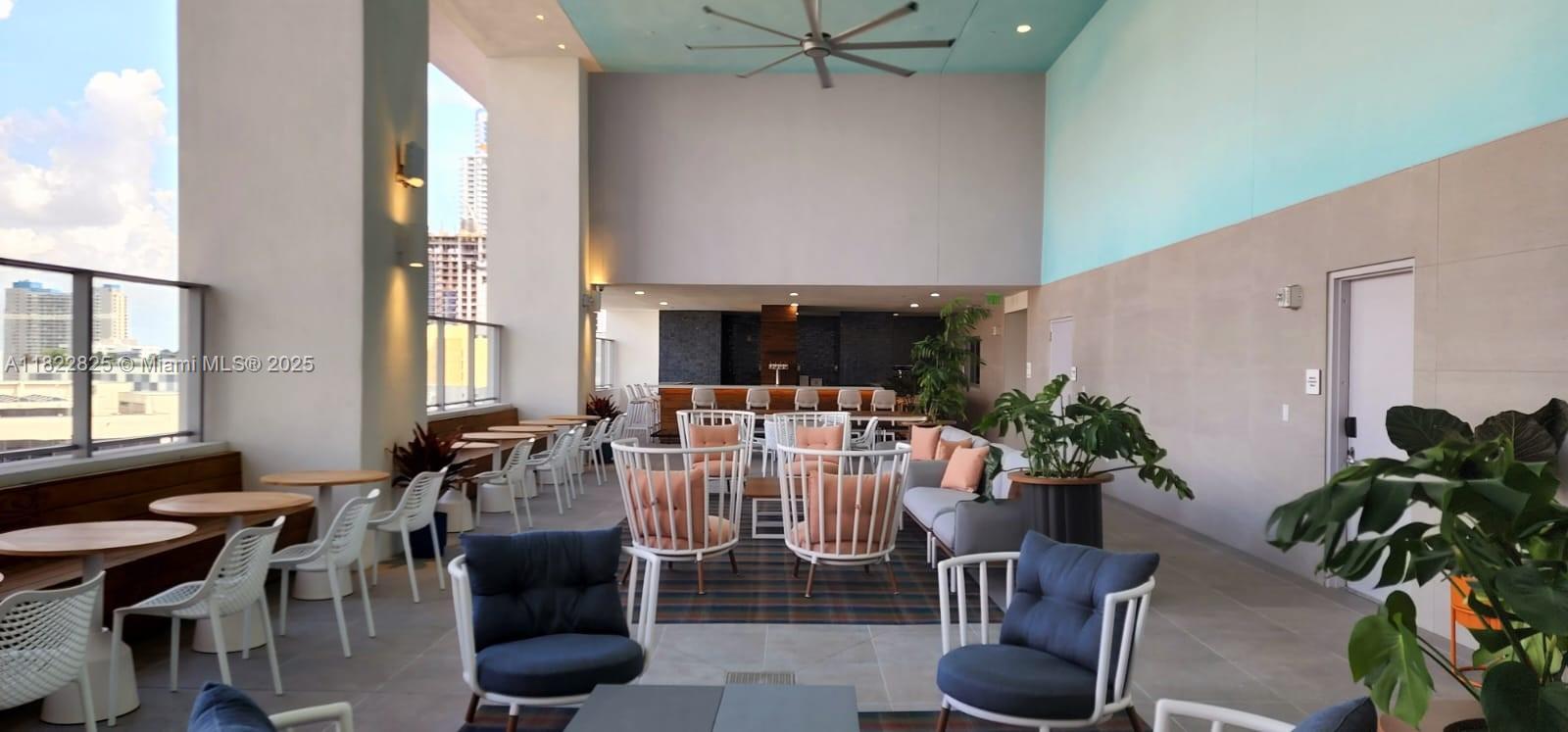 227 Northeast 2nd Street, Unit 2907 Miami, FL 33132 - Photo 18 of 36 a view of a dining room with furniture window and outside view