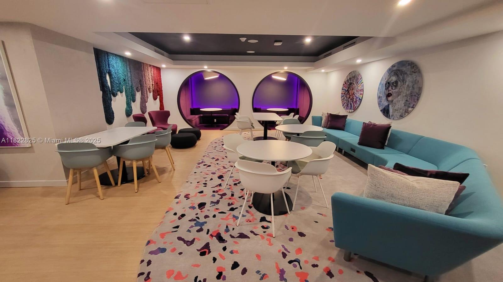 227 Northeast 2nd Street, Unit 2907 Miami, FL 33132 - Photo 20 of 36 a very nice looking dining room with many chairs and a table