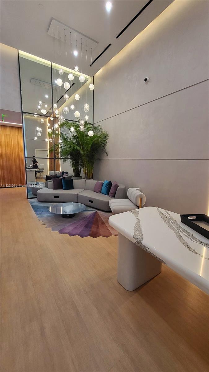 227 Northeast 2nd Street, Unit 2907 Miami, FL 33132 - Photo 23 of 36 a very nice looking room with a large window