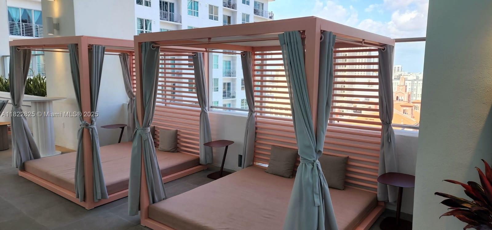 227 Northeast 2nd Street, Unit 2907 Miami, FL 33132 - Photo 25 of 36 a view of balcony with furniture