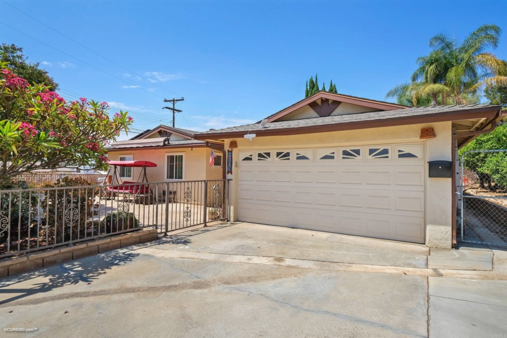 a front view of a house with a garage