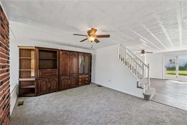 an empty room with a empty shelves