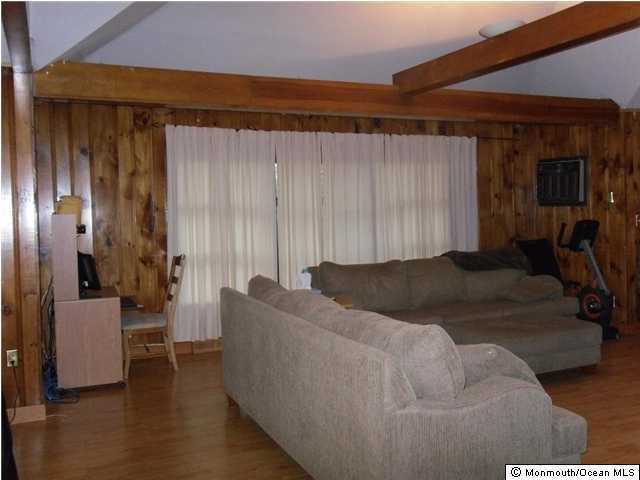 526 Cerrina Road Jackson, NJ 08527 - Photo 3 of 3 a living room with furniture and a window