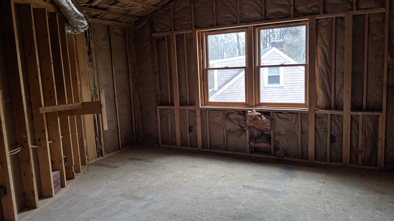 10 Arbor Way Hyannis, MA 02601 - Photo 13 of 17 a view of an empty room with wooden walls