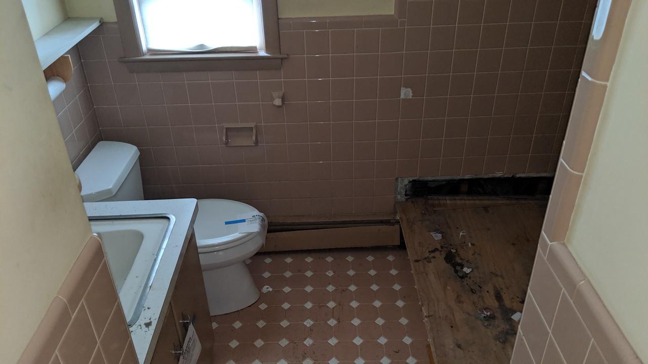 10 Arbor Way Hyannis, MA 02601 - Photo 15 of 17 a bathroom with a toilet and a shower