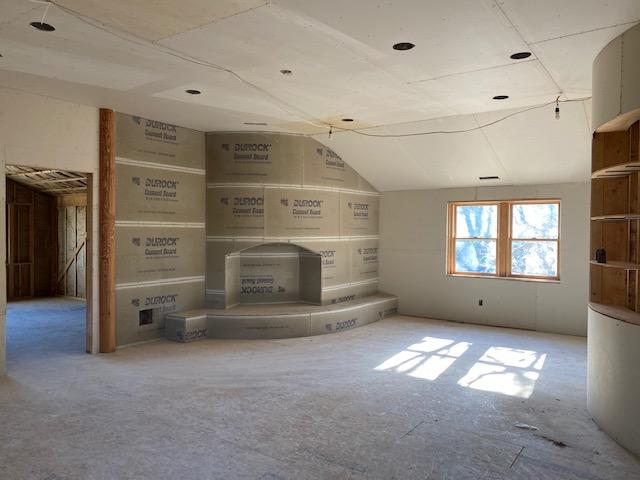 10 Arbor Way Hyannis, MA 02601 - Photo 8 of 17 a living room with furniture and a fireplace