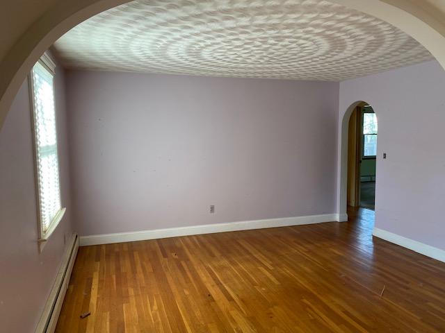 10 Arbor Way Hyannis, MA 02601 - Photo 10 of 17 a view of empty room with wooden floor and fan