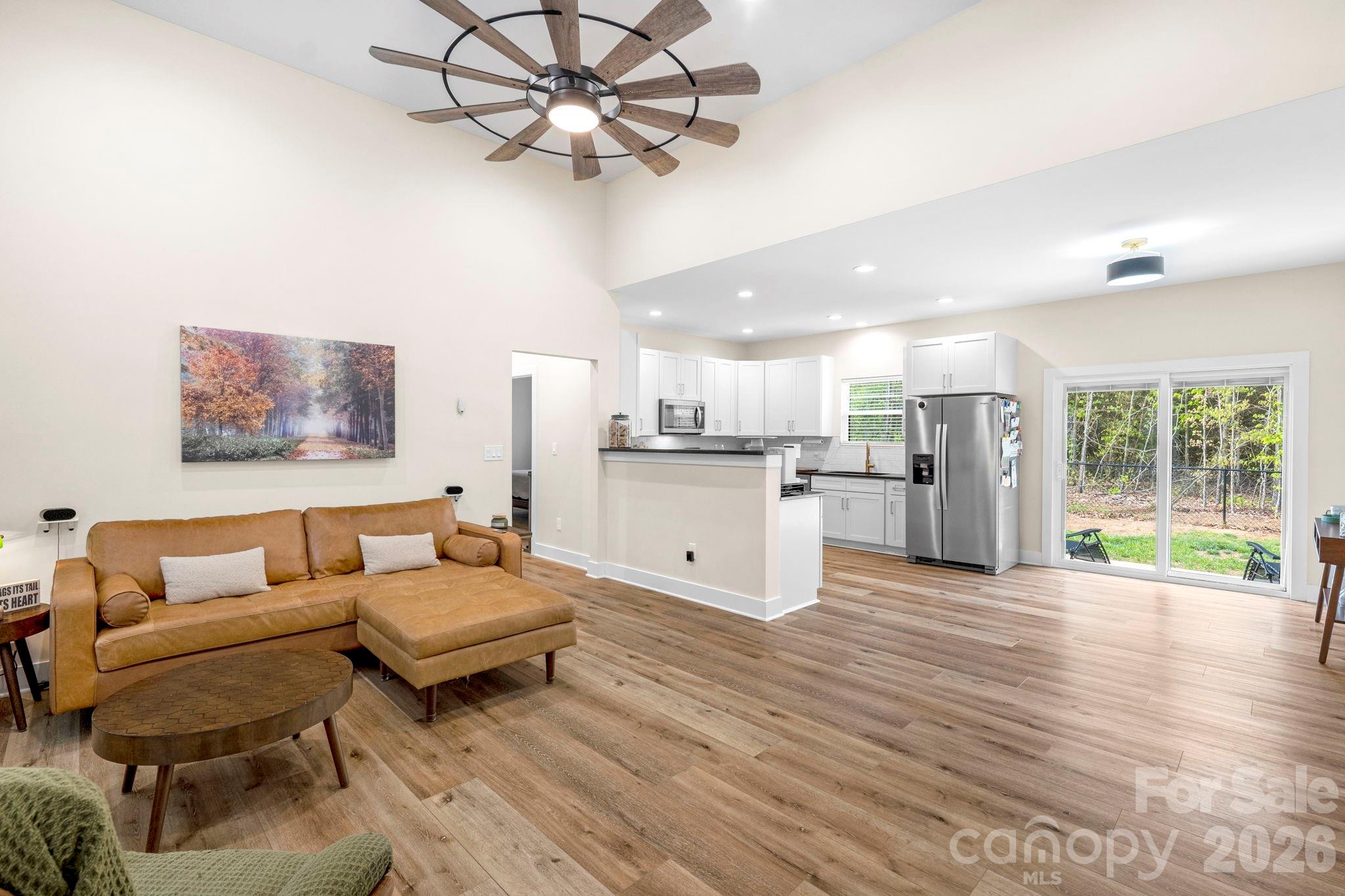 2462 Shoal Road Crouse, NC 28033 - Photo 11 of 35 a living room with furniture and a wooden floor