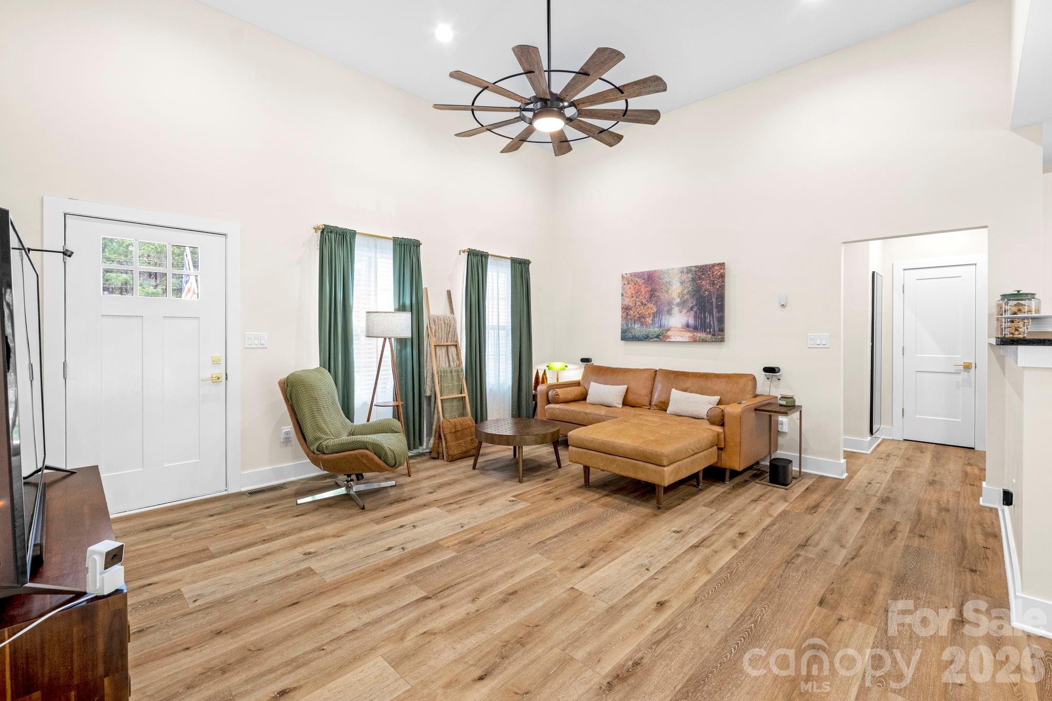 2462 Shoal Road Crouse, NC 28033 - Photo 12 of 35 a living room with furniture and a wooden floor