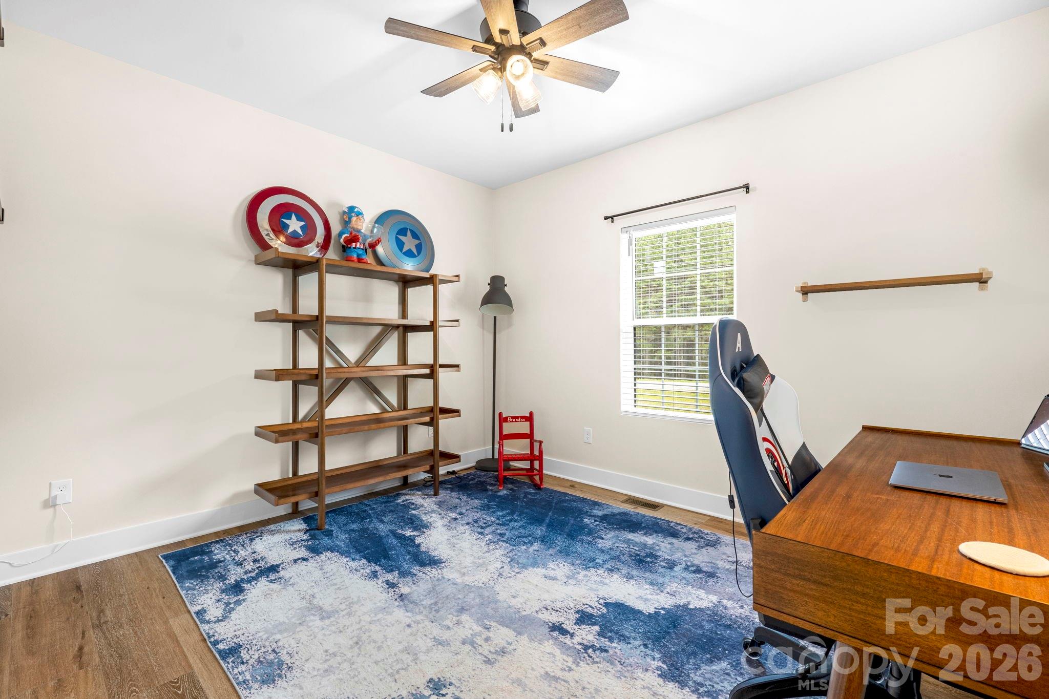 2462 Shoal Road Crouse, NC 28033 - Photo 27 of 35 a view of a workspace with furniture and wooden floor