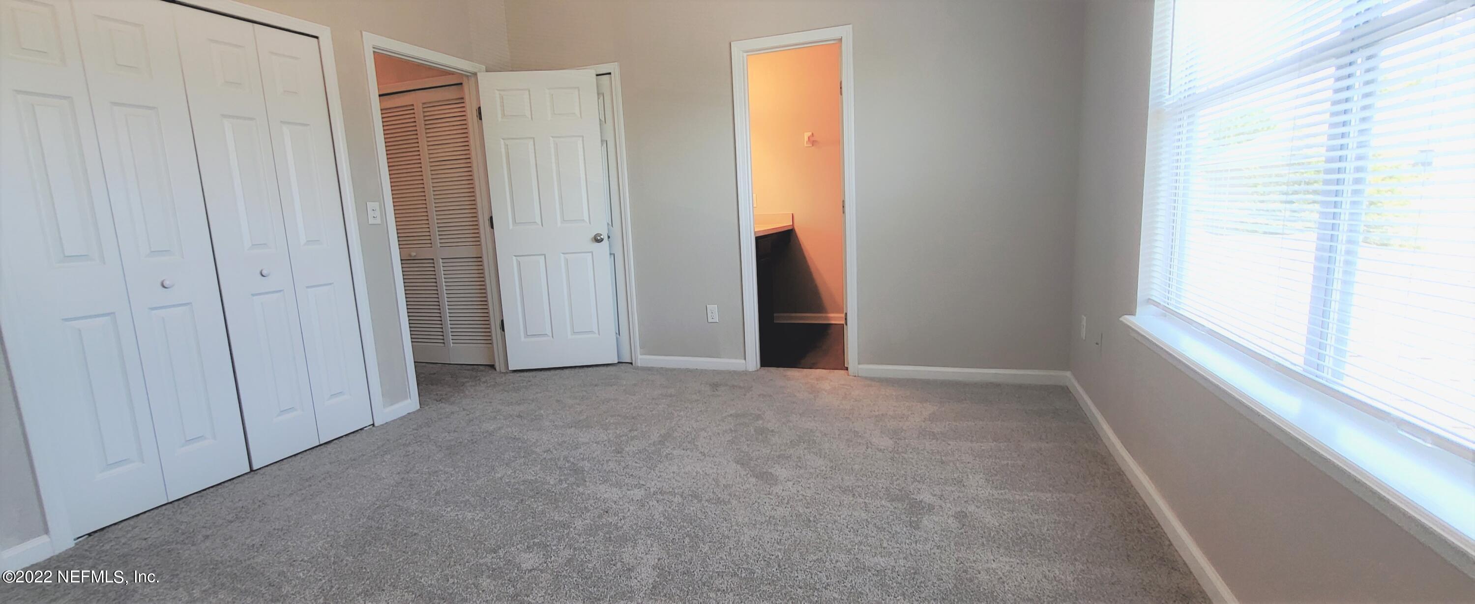640 Wishing Way Orange Park, FL 32073 - Photo 8 of 10 a view of hallway with windows