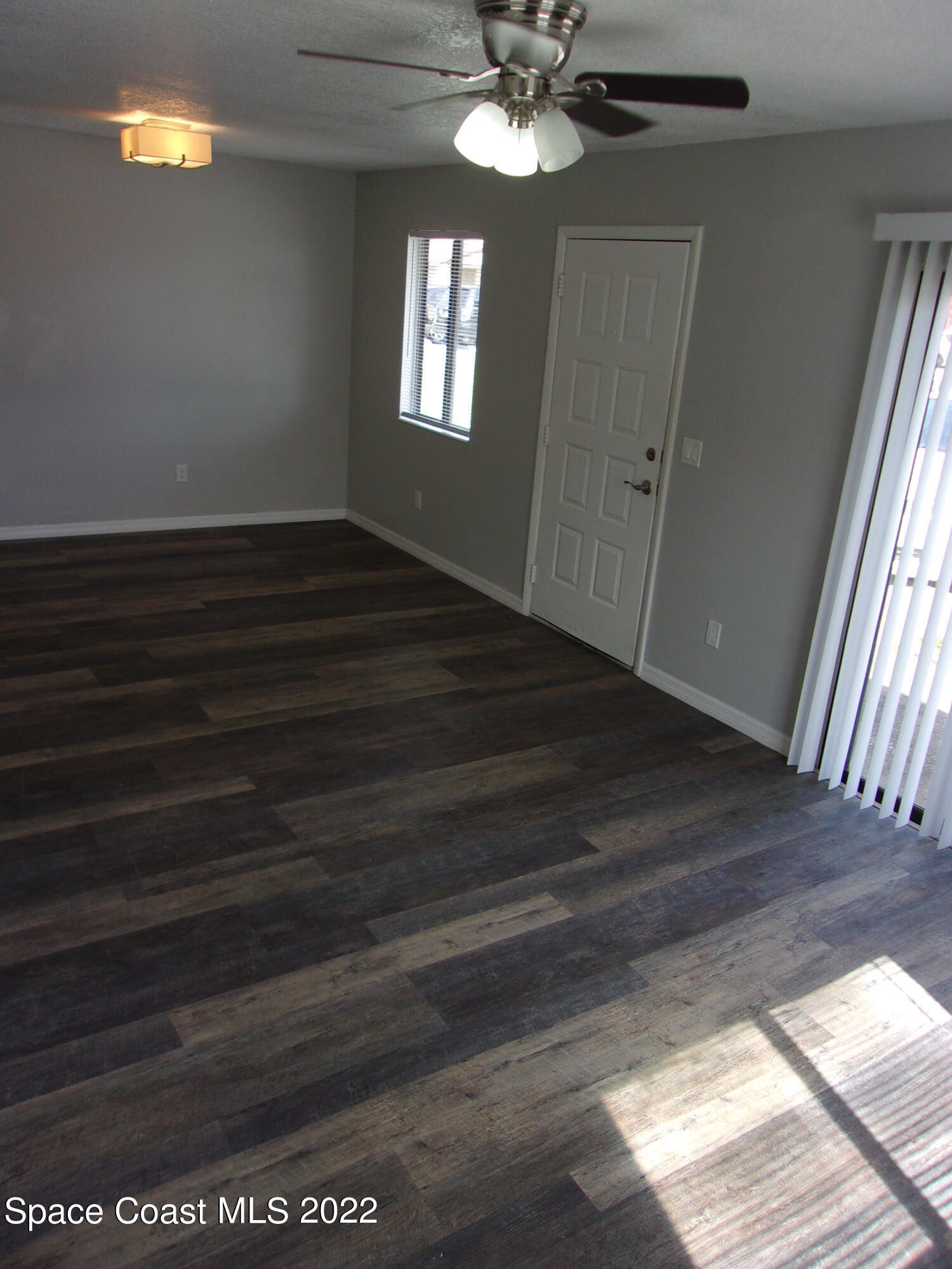 1050 North Fiske Boulevard, Unit 406 Cocoa, FL 32922 - Photo 3 of 11 a view of an entryway with a window
