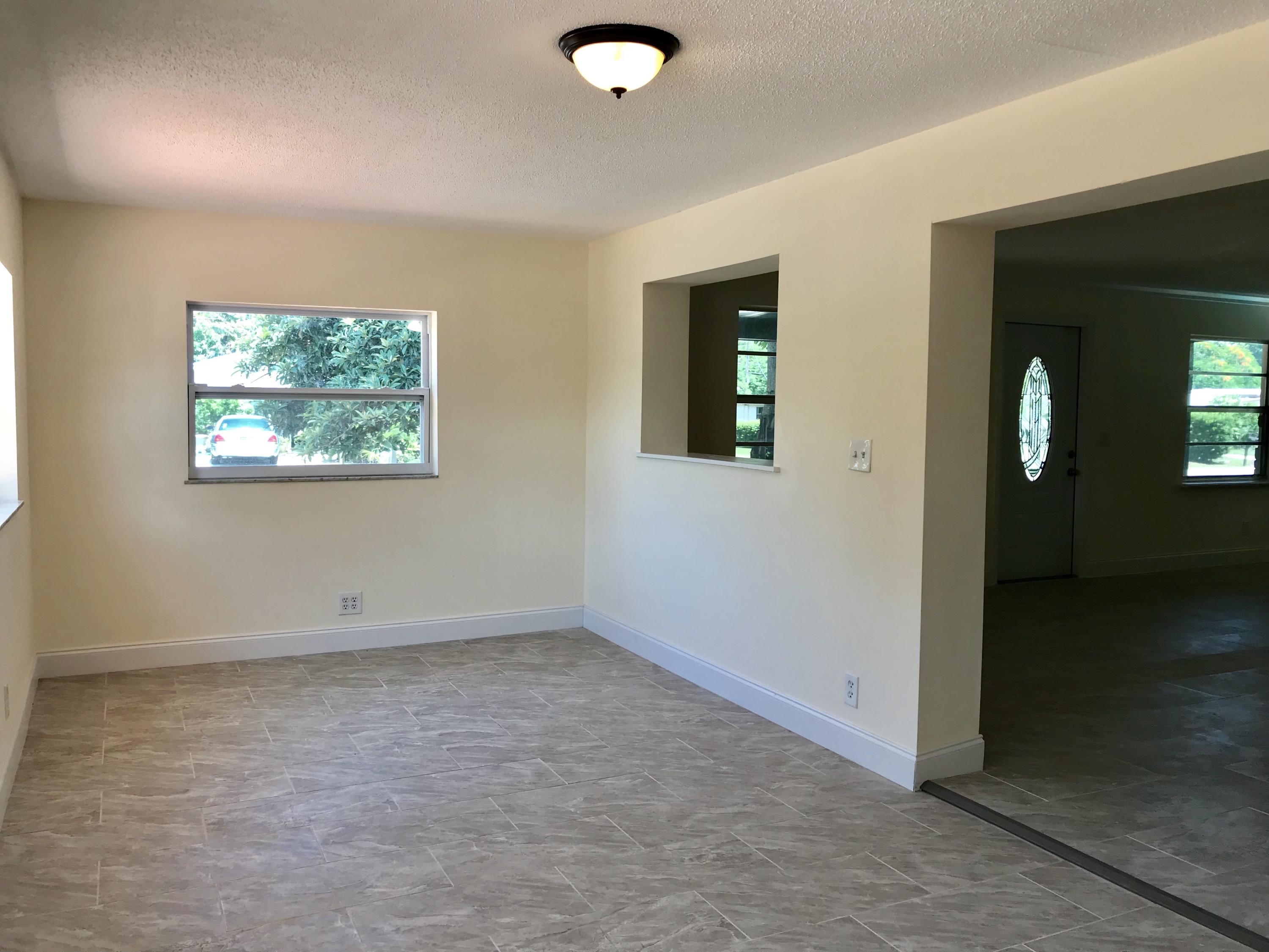 14827 Whatley Road Delray Beach, FL 33445 - Photo 23 of 36 an empty room with windows