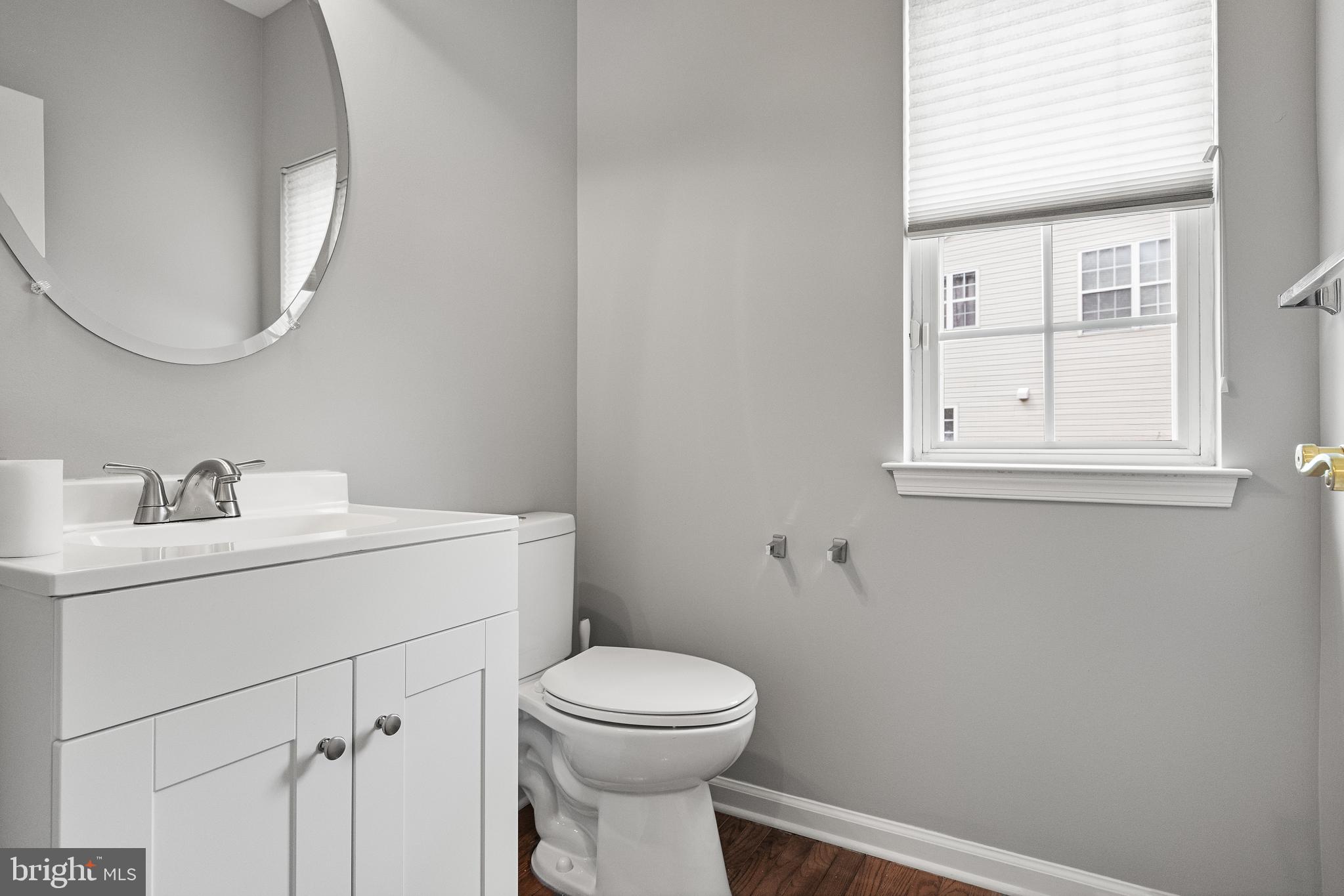 49 Cranberry Lane Delran, NJ 08075 - Photo 16 of 33 a bathroom with a toilet sink vanity and mirror