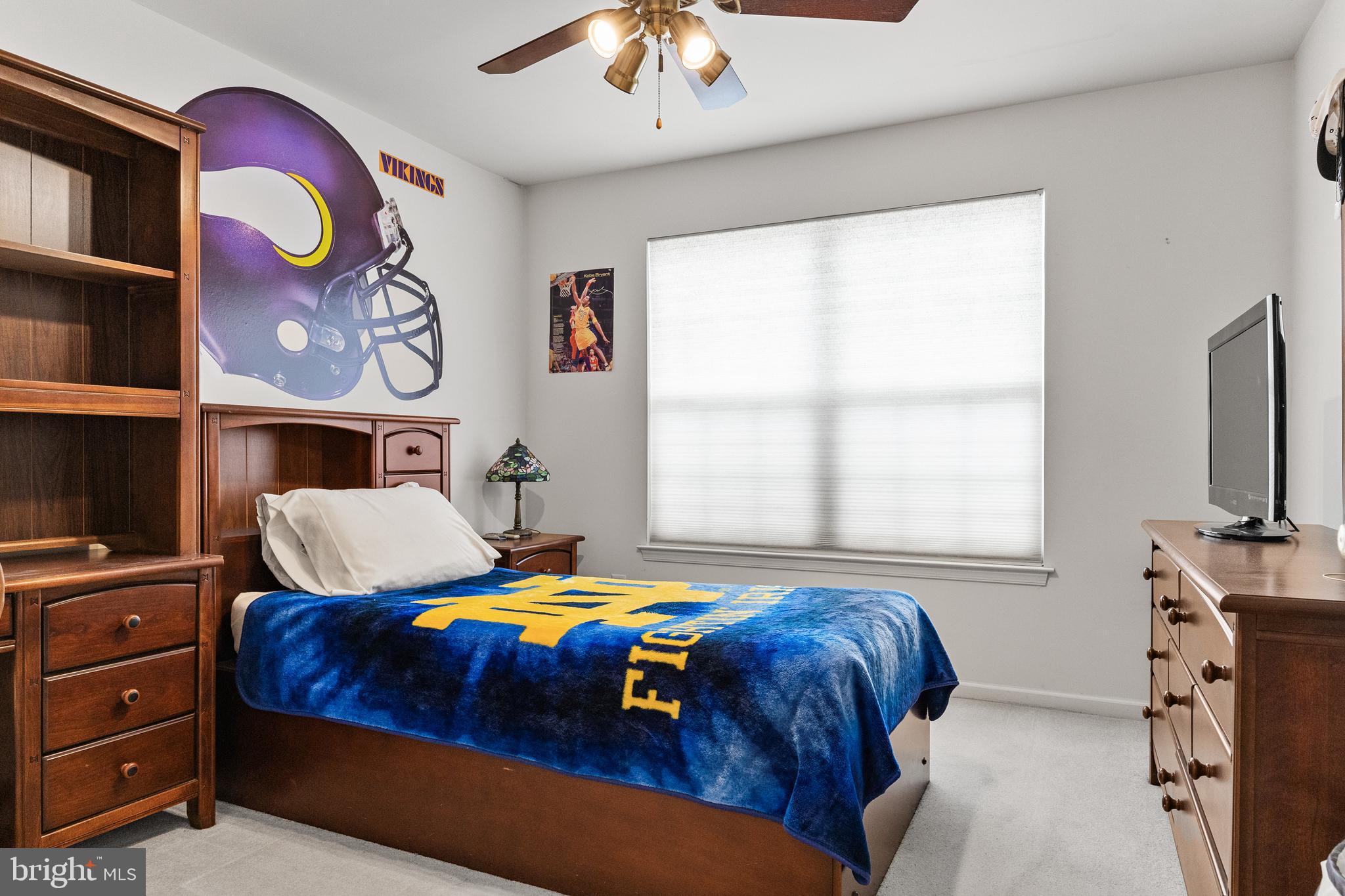 49 Cranberry Lane Delran, NJ 08075 - Photo 21 of 33 a bedroom with a bed and a chandelier