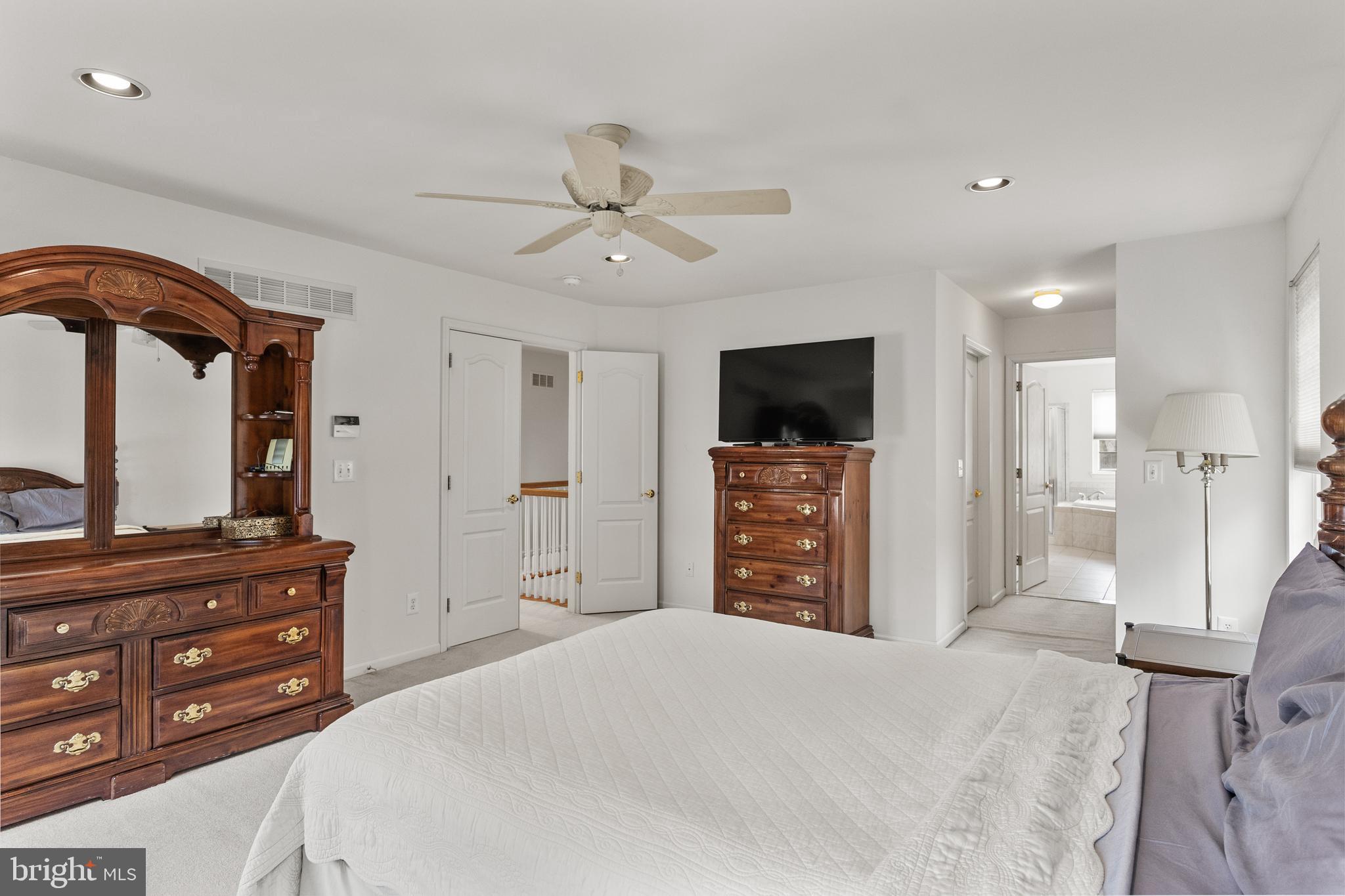 49 Cranberry Lane Delran, NJ 08075 - Photo 24 of 33 a bedroom with a bed and a flat screen tv