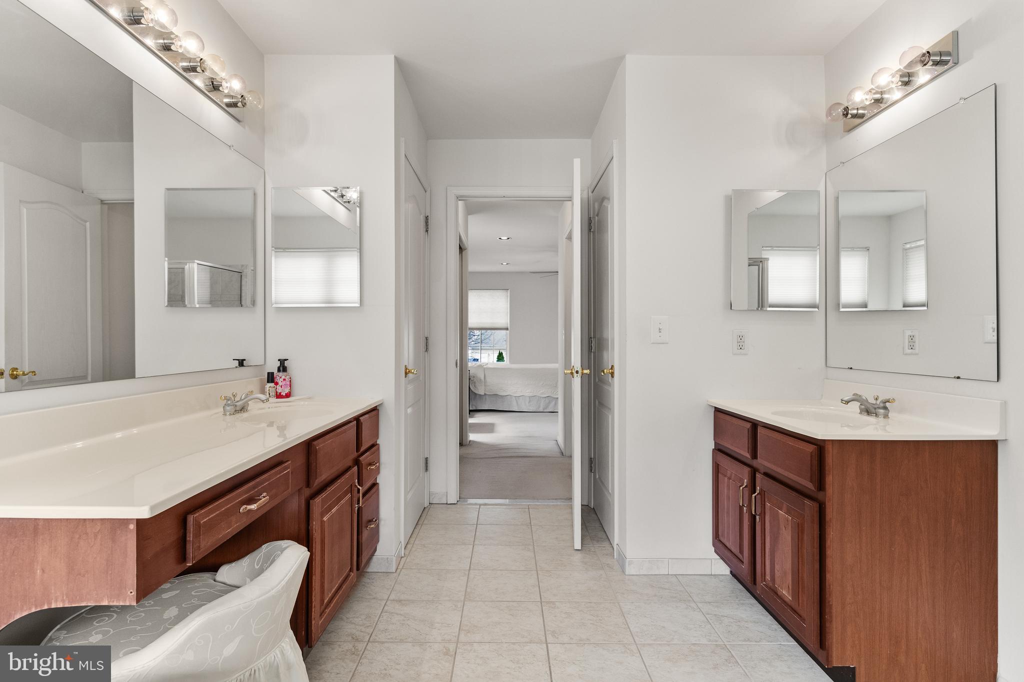 49 Cranberry Lane Delran, NJ 08075 - Photo 26 of 33 a bathroom with a sink a vanity and a mirror