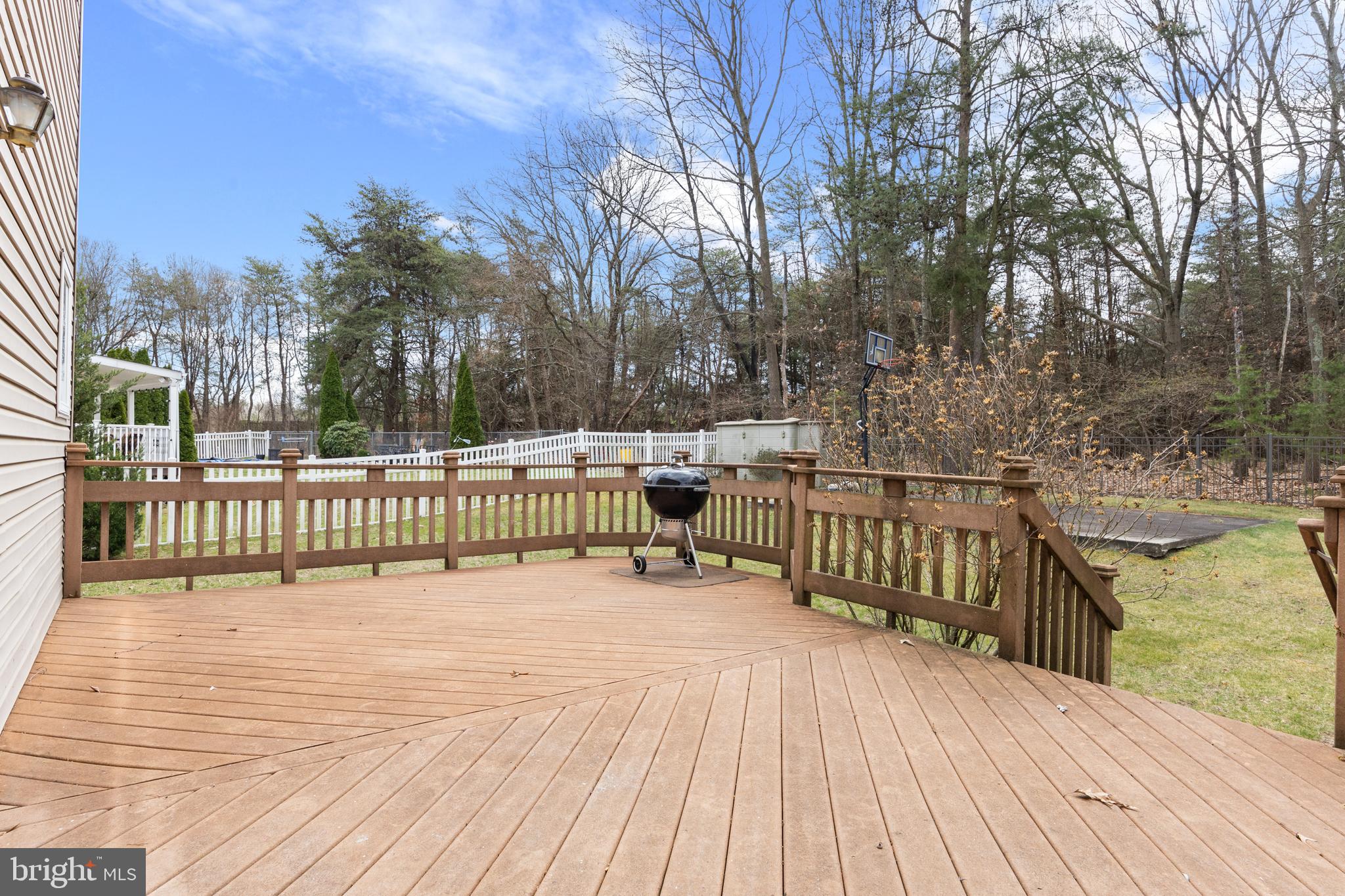 49 Cranberry Lane Delran, NJ 08075 - Photo 29 of 33 a view of a wooden deck and a yard