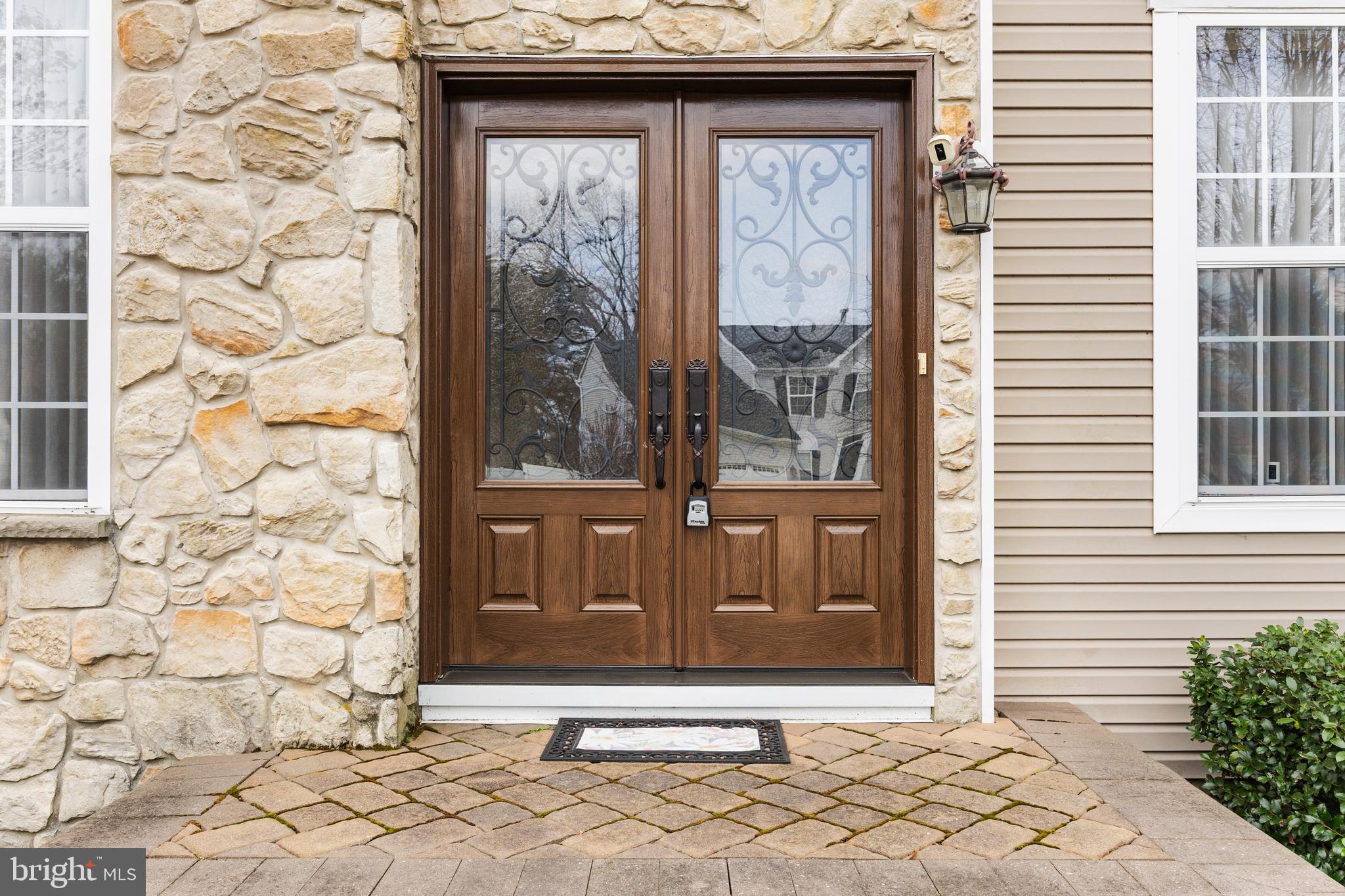 49 Cranberry Lane Delran, NJ 08075 - Photo 3 of 33 a front view of a house with a yard and seating space