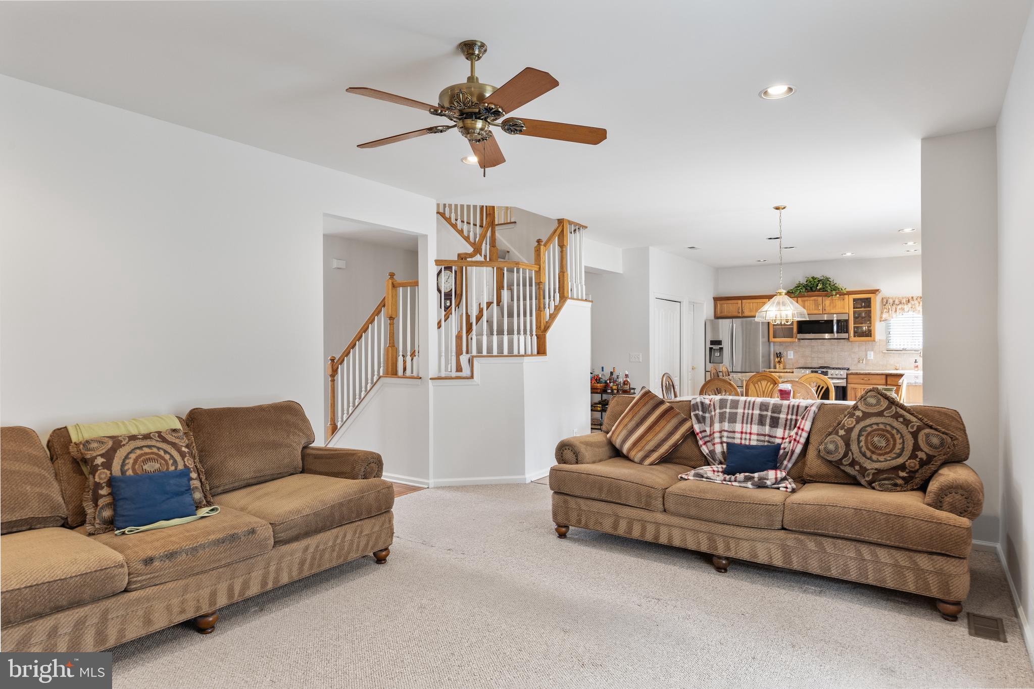 49 Cranberry Lane Delran, NJ 08075 - Photo 9 of 33 a living room with furniture and a ceiling fan